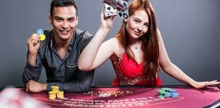 Smartphone screen showing jackpot play app interface with Liga 1 football market and payment options